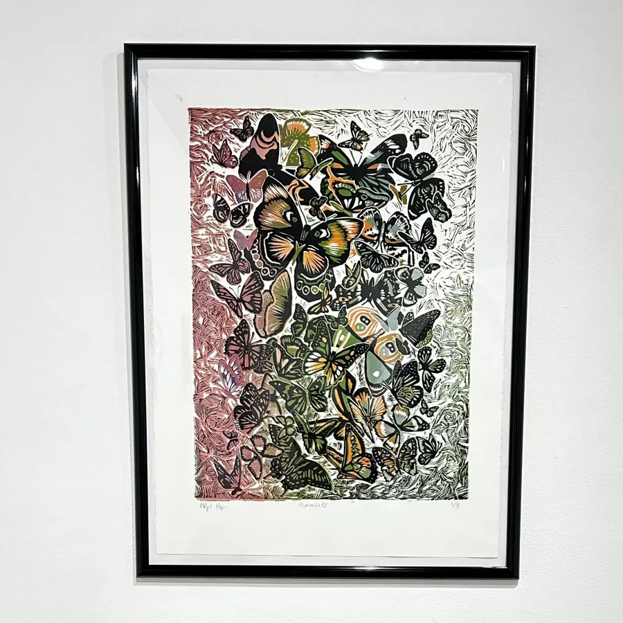 Framed print densely filled with butterflies